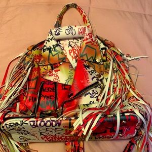 Colorful Jean Jacket Purse. Never worn , very fashionable.